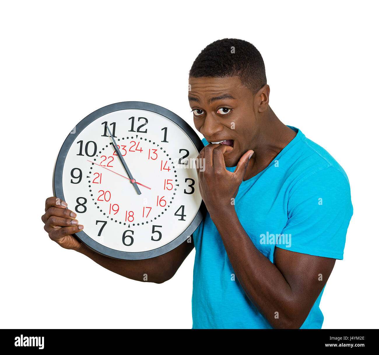 Closeup portrait funny looking man student holding wall clock, stressed ...