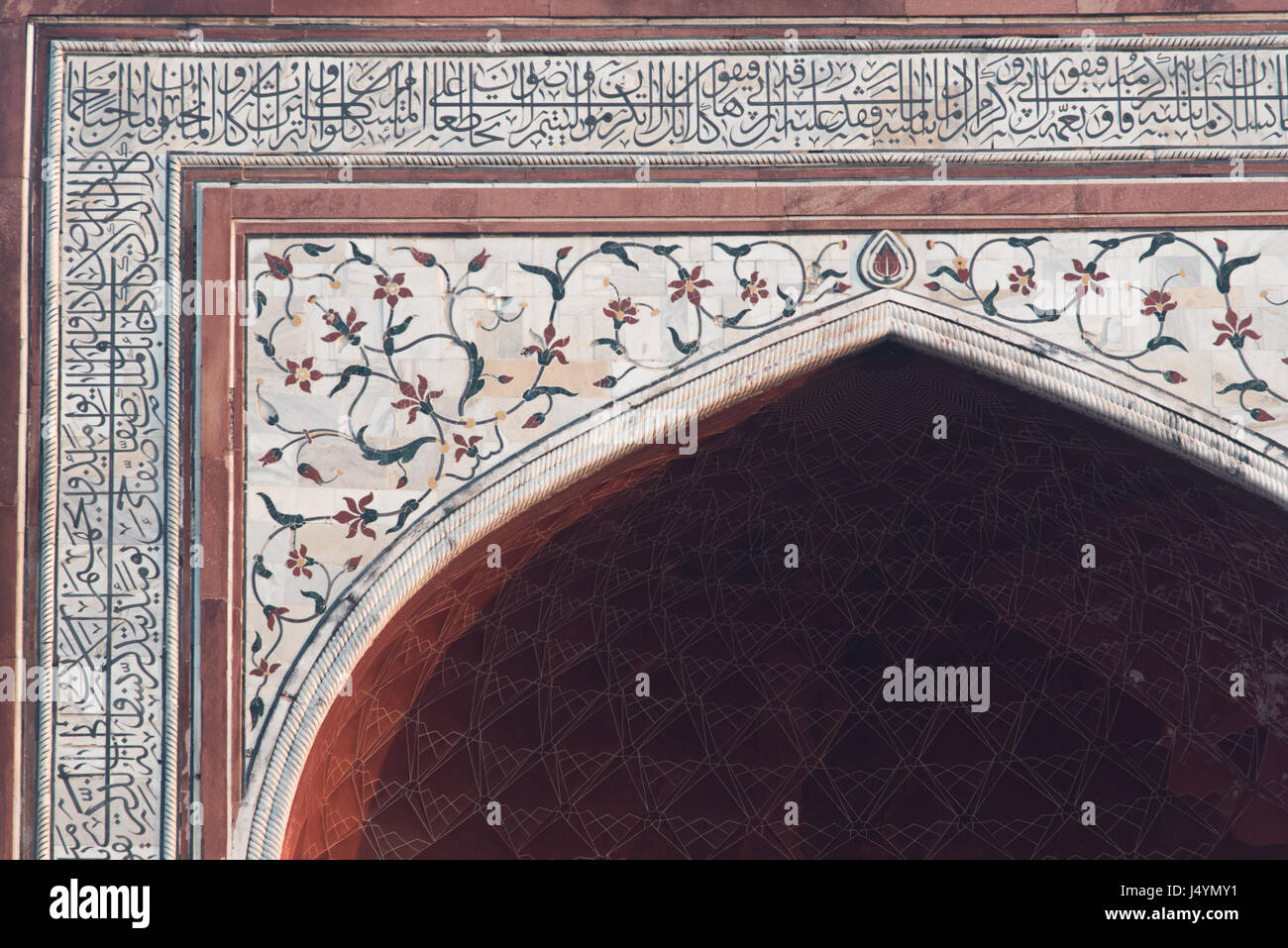 Flowery mural at the main gate to Taj Mahal in Agra, India Stock Photo