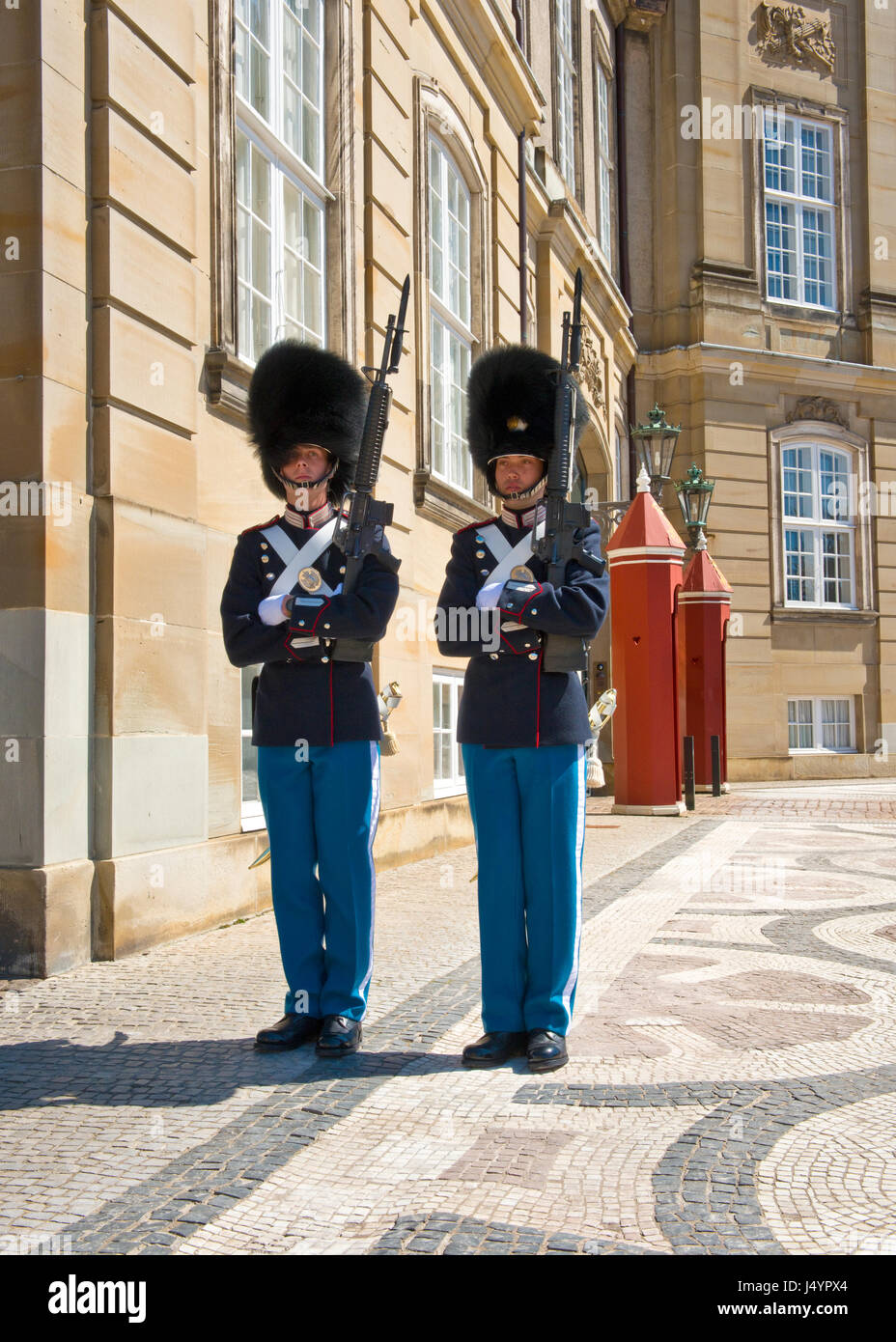 Royal sentry soldier outside gates of Royal Palace at Amalienborg, Copenhagen Stock Photo
