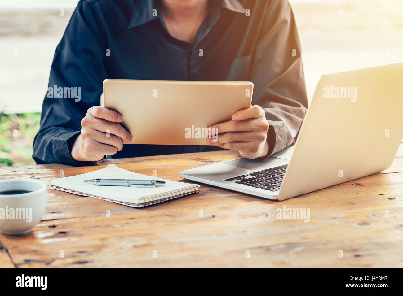 Young people using tablet laptop hi-res stock photography and images ...