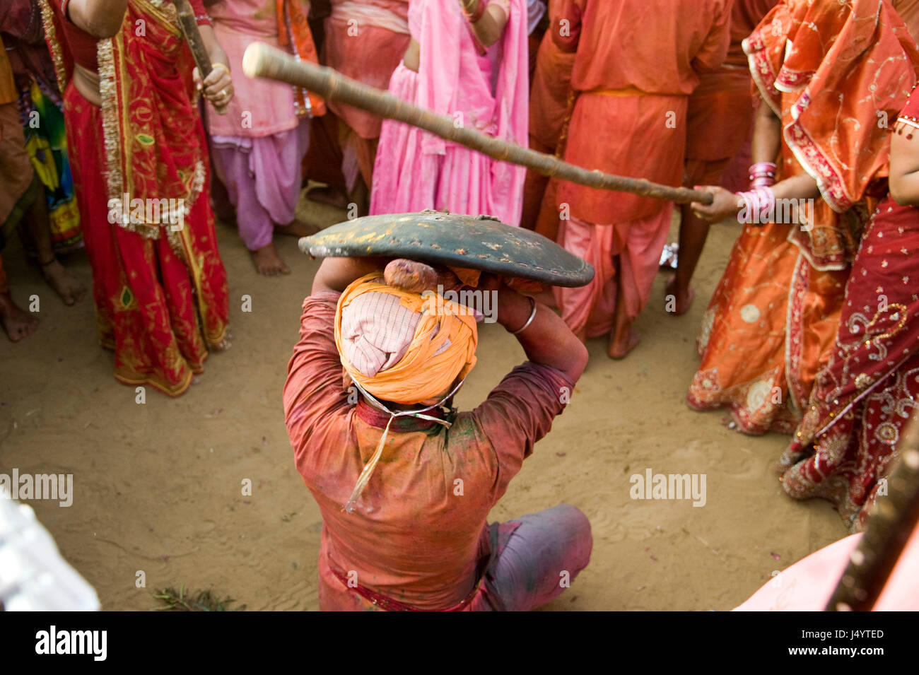 People celebrating lathmar, holi festival, mathura, uttar pradesh, india, asia Stock Photo