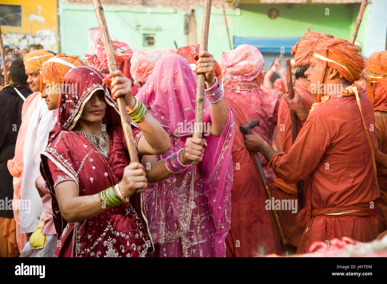 People celebrating lathmar, holi festival, mathura, uttar pradesh, india, asia Stock Photo