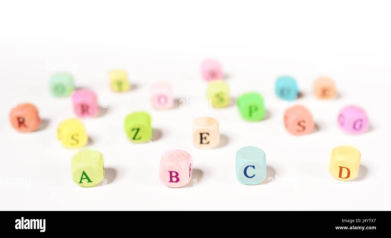 Colorful English alphabet cubes as background Stock Photo
