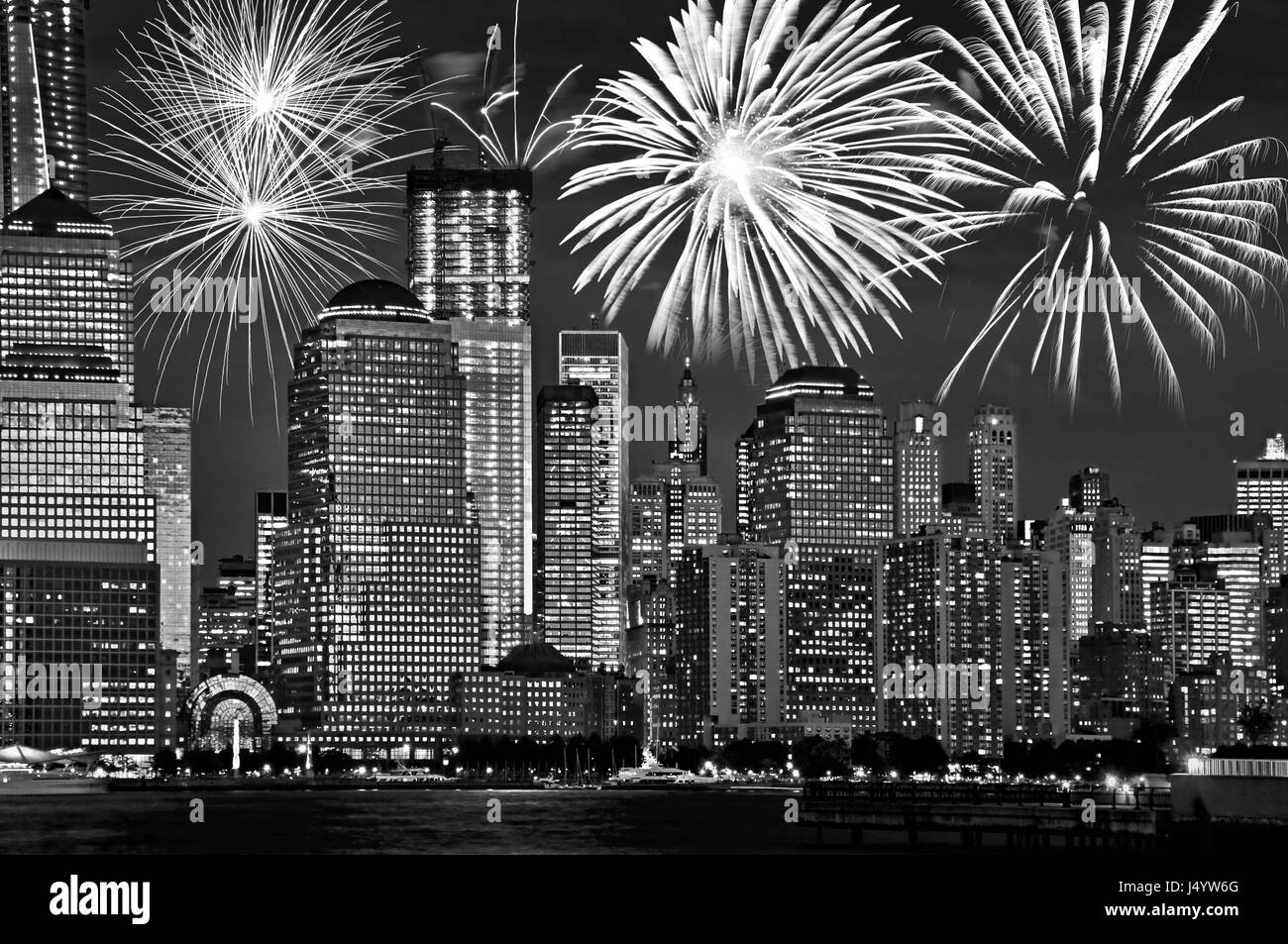 New York Manhattan skyline at night, with fireworks, american US celebration and party, black and white image Stock Photo