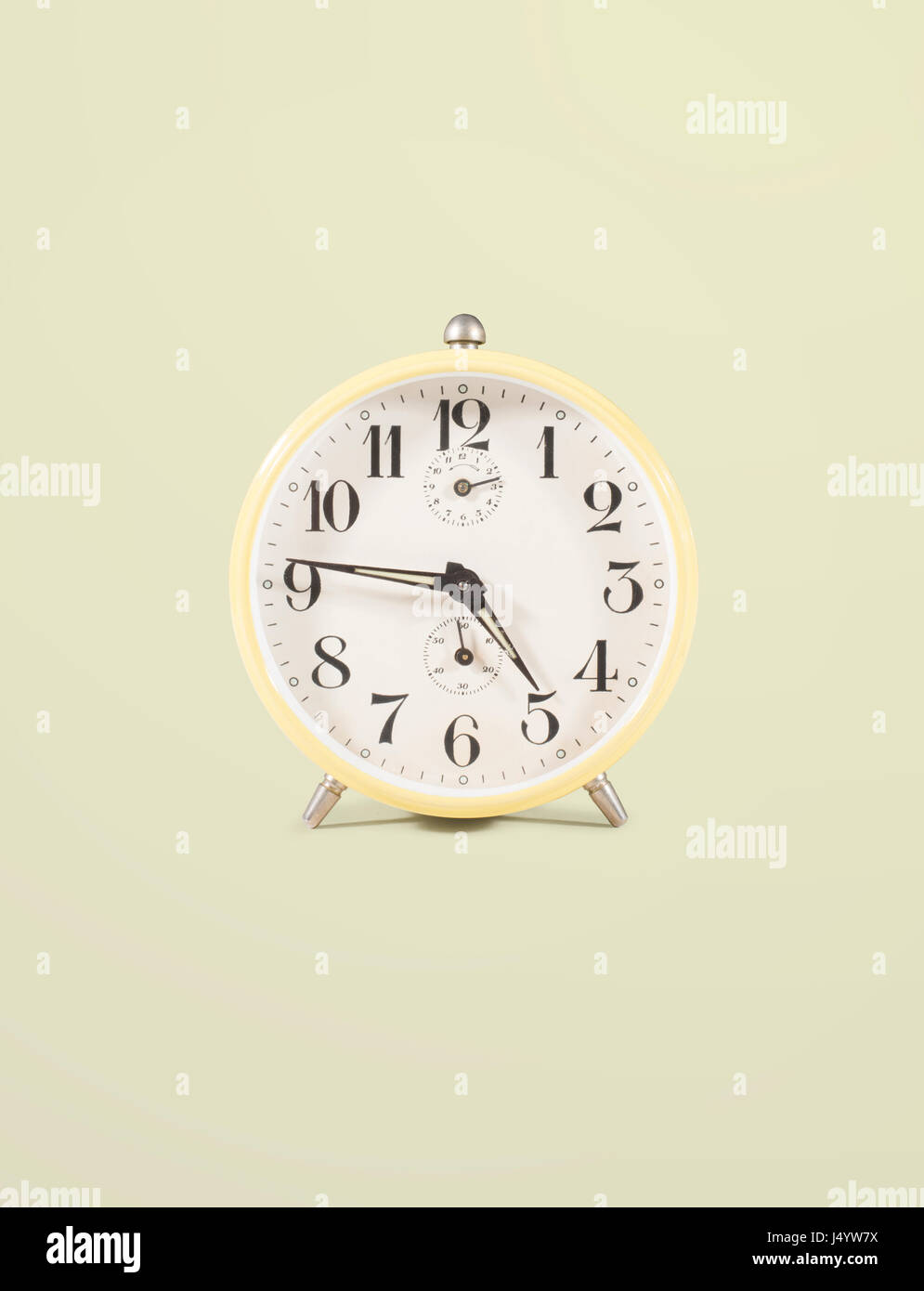isolated retro alarm clock on white background Stock Photo - Alamy