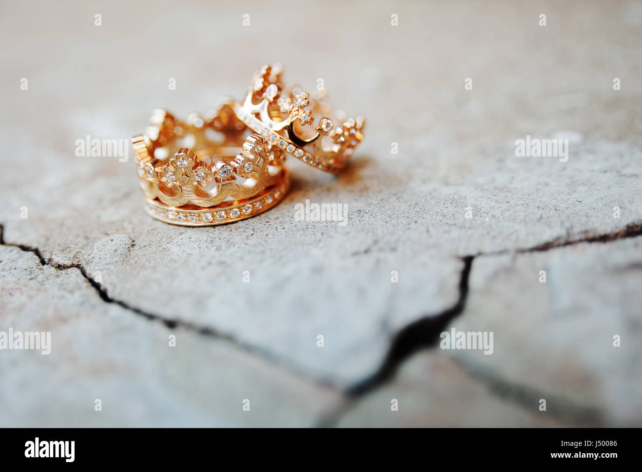 wedding rings crown Stock Photo - Alamy
