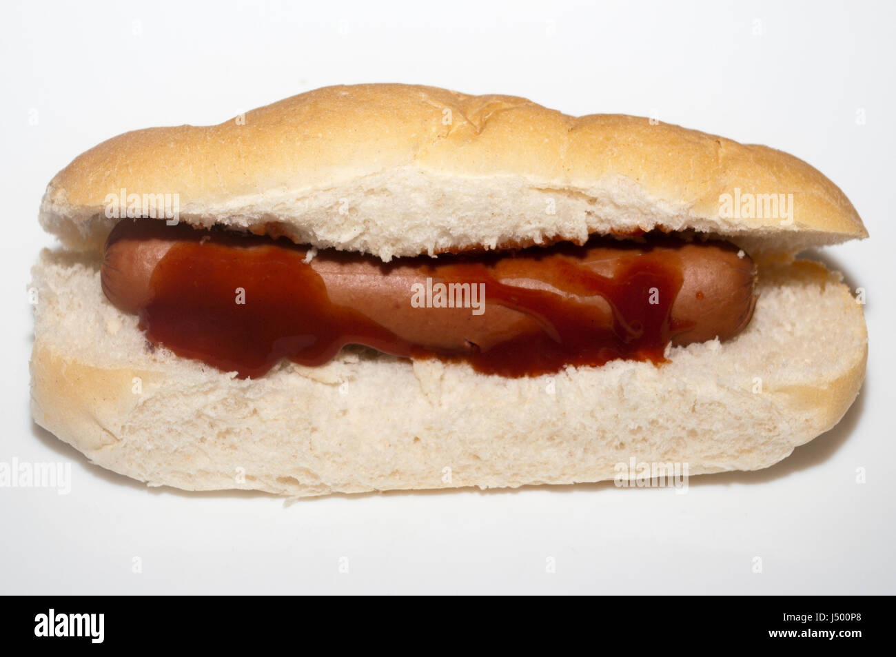 Hot Dog Sausage In A Roll with Brown Sauce Stock Photo Alamy