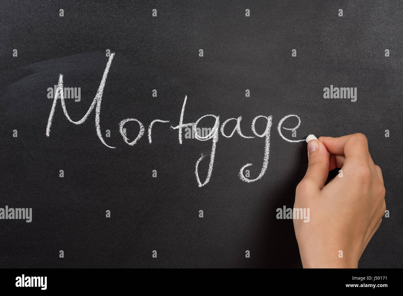 Mortgage word written on the blackboard Stock Photo