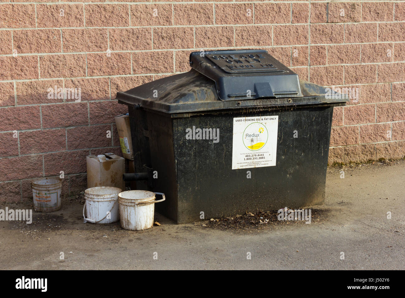Old cooking oil dumpster hires stock photography and images Alamy