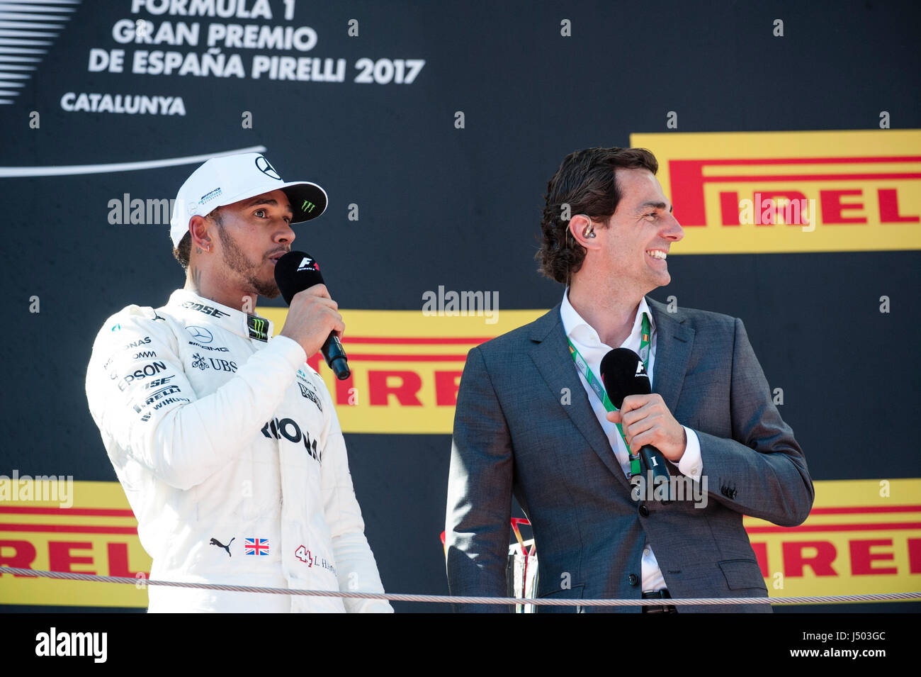 Barcelona, Spain. 14 May, 2017. Left, Lewis Hamilton, driver of the Mercedes AMG F1 Team and rigth, the ex-Formula 1 driver Pedro de la Rosa (ESP) at the podium,   during the Sunday race day, Formula One Spanish Grand Prix at the Circuit of Catalunya. Credit: Pablo Guillen/Alamy Live News Stock Photo