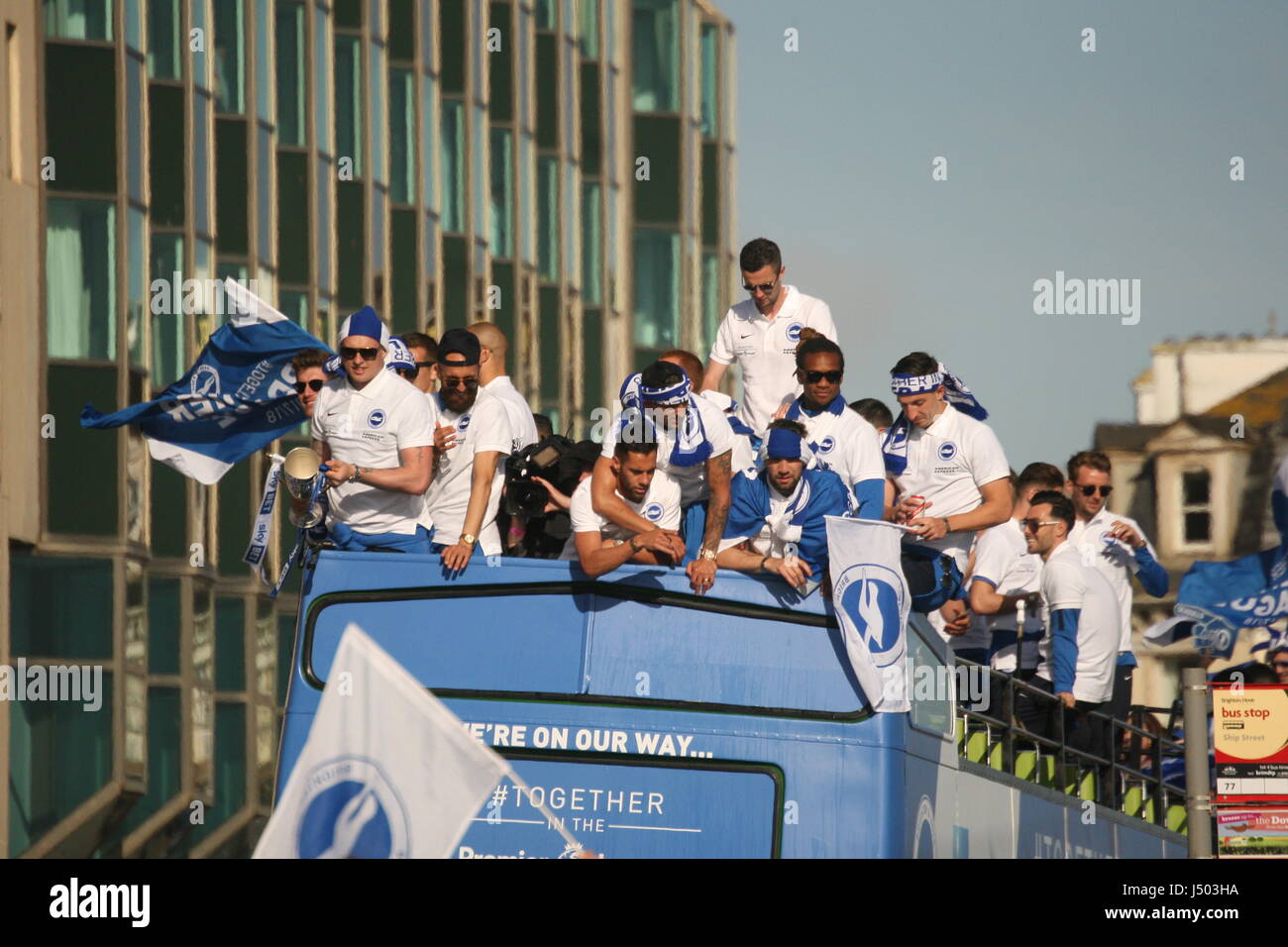 Brighton, UK. 14th May 2017. Fans of Brighton and Hove Albion Football Club Came out in their thousands to watch the team's bus-top parade along the city's coast road. Team and fans were celebrating promotion to the Premiership. Roland Ravenhill/ Alamy Live News Stock Photo