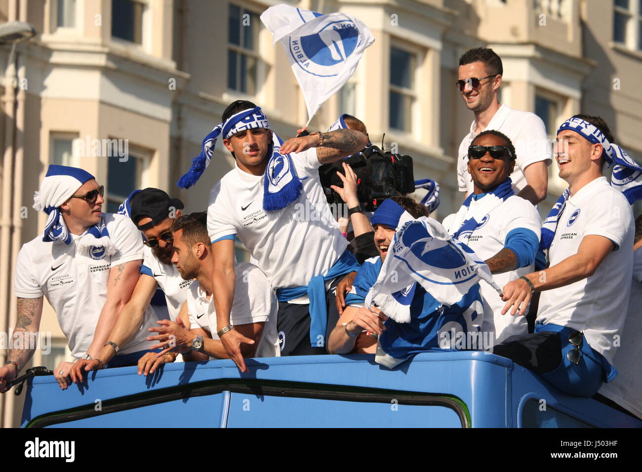 Brighton, UK. 14th May 2017.Brighton players on the open deck of a bus. they are: (L to R) David Stockdale, Bruno Saltor, Sam Baldock, Anthony Knockaert, Shane Duffy, Jamie Murphy, Gaetan Bong, Lewis Dunk.   Fans of Brighton and Hove Albion Football Club Came out in their thousands to watch the team's bus-top parade along the city's coast road. Team and fans were celebrating promotion to the Premiership. Roland Ravenhill/ Alamy Live News Stock Photo