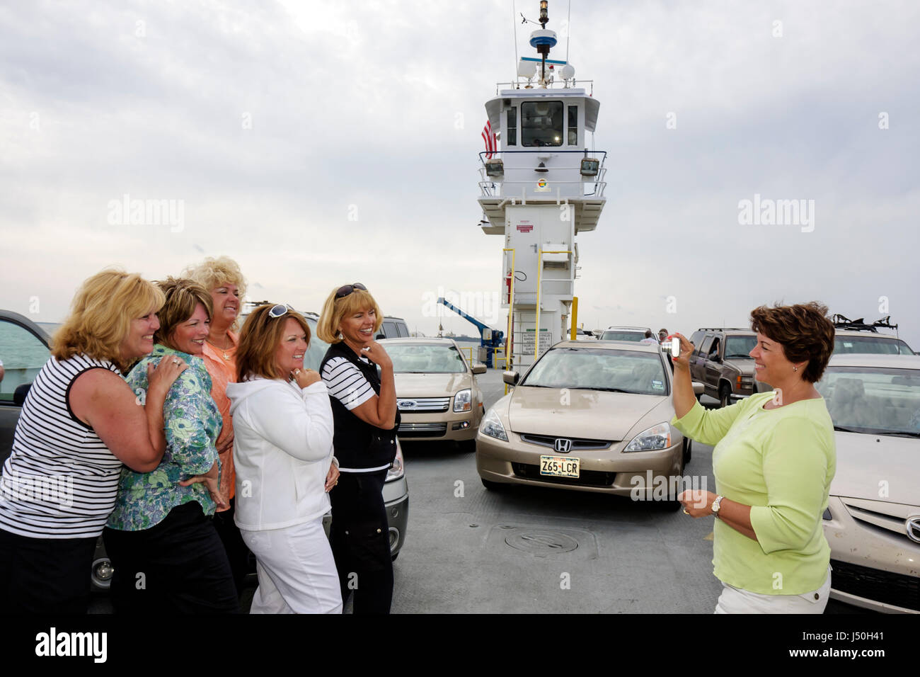Alabama Fort Morgan,Fort Morgan Ferry,Mobile Bay water,adult adults woman women female lady,women,friends,group,girlfriends' day,ham it up,posing,pose Stock Photo