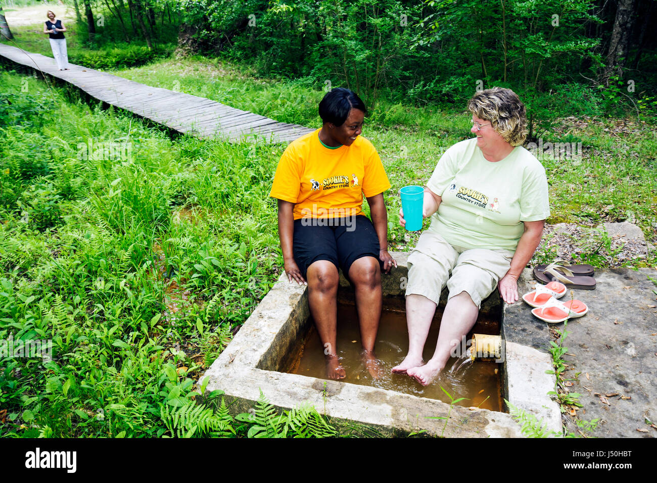 Alabama,Millry,Healing Springs,Black woman female women,holistic,mineral,water,soak,therapeutic,feet,AL080514049 Stock Photo