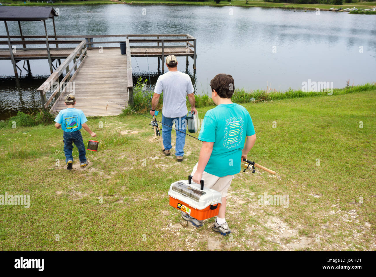 Alabama Millry,Emmett Wood State Lake,fishing,man men male adult adults,boy boys,kid kids child children youngster youngsters youth youths family fami Stock Photo