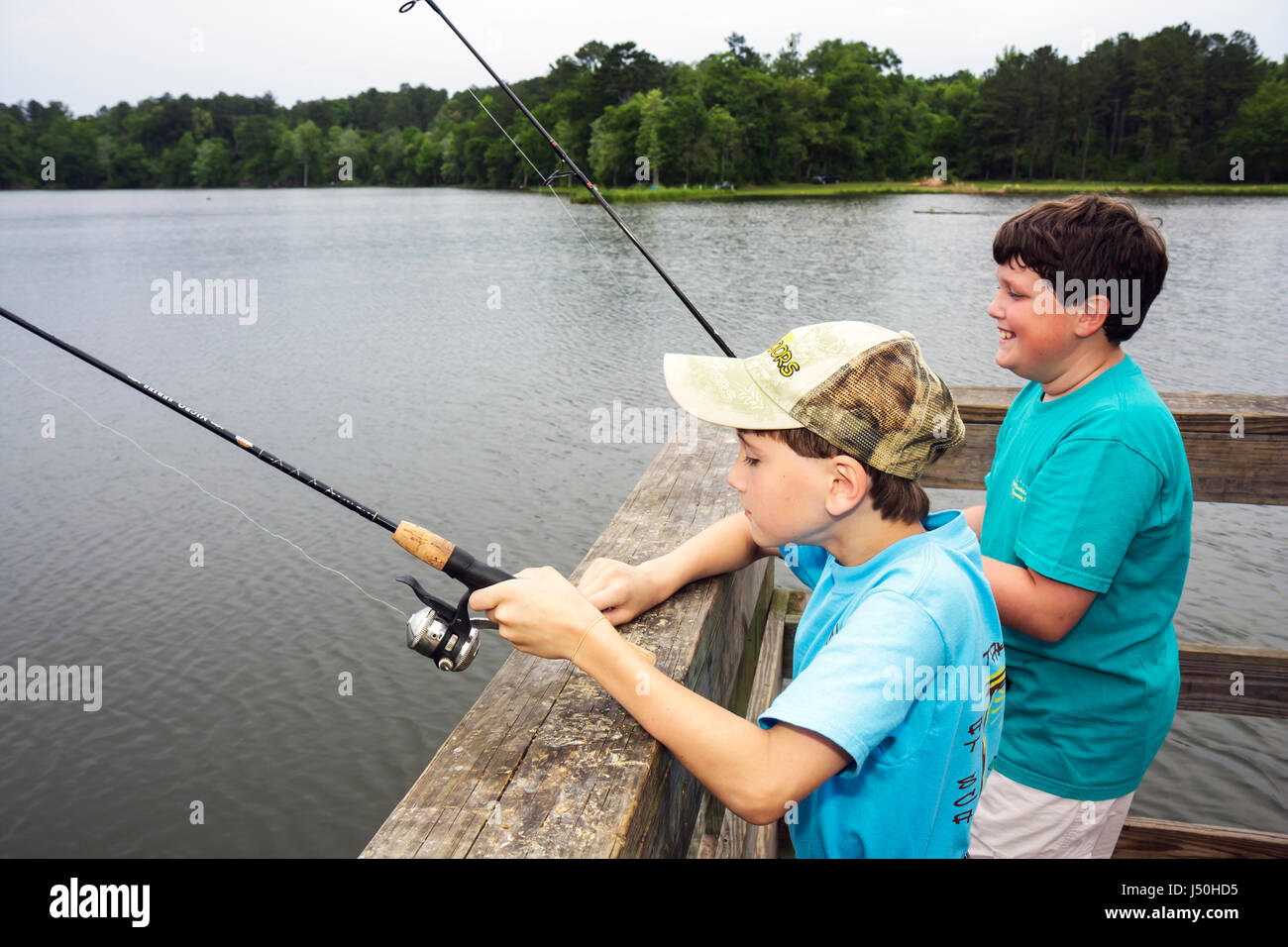 Alabama,Millry,Emmett Wood State Lake,fishing,boy boys,male kid kids child children youngster,kids,rod,reel,angler,water sport,recreation,hobby,AL0805 Stock Photo