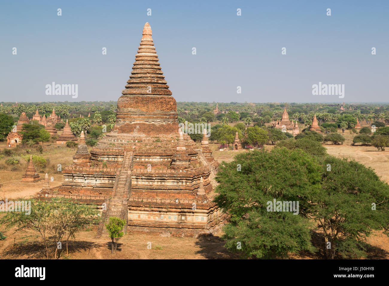 Many stupas, temples and pagodas in the ancient plain of Bagan in Myanmar (Burma), viewed from the Bulethi (Buledi) Temple. Stock Photo