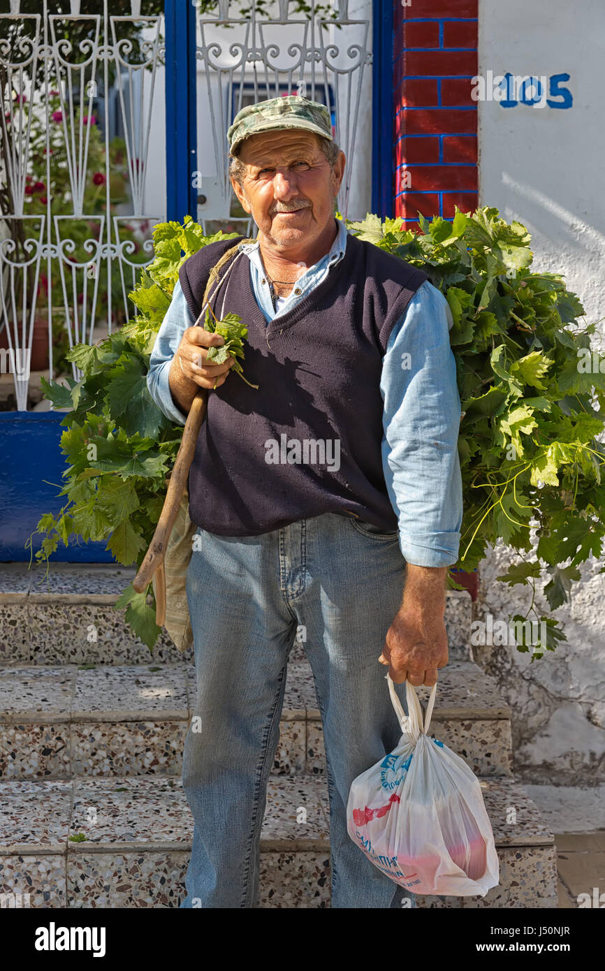 Amorgos Island, Greece - October 2015: Greek man posing.The people in Greece are affraid how the Greek debt crisis has his impact on there lives and w Stock Photo