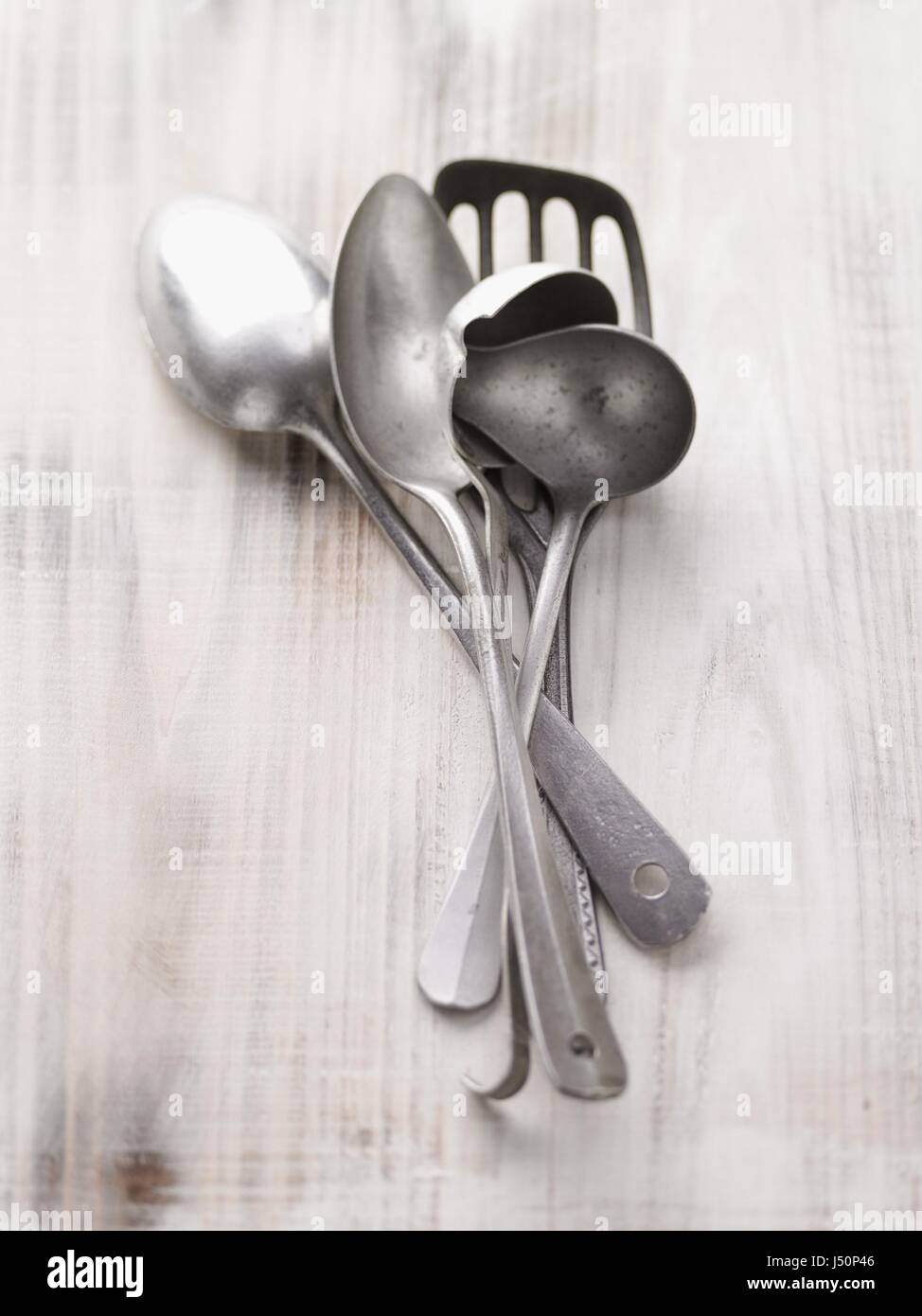 Spoons and spatulas on wooden underground Stock Photo Alamy