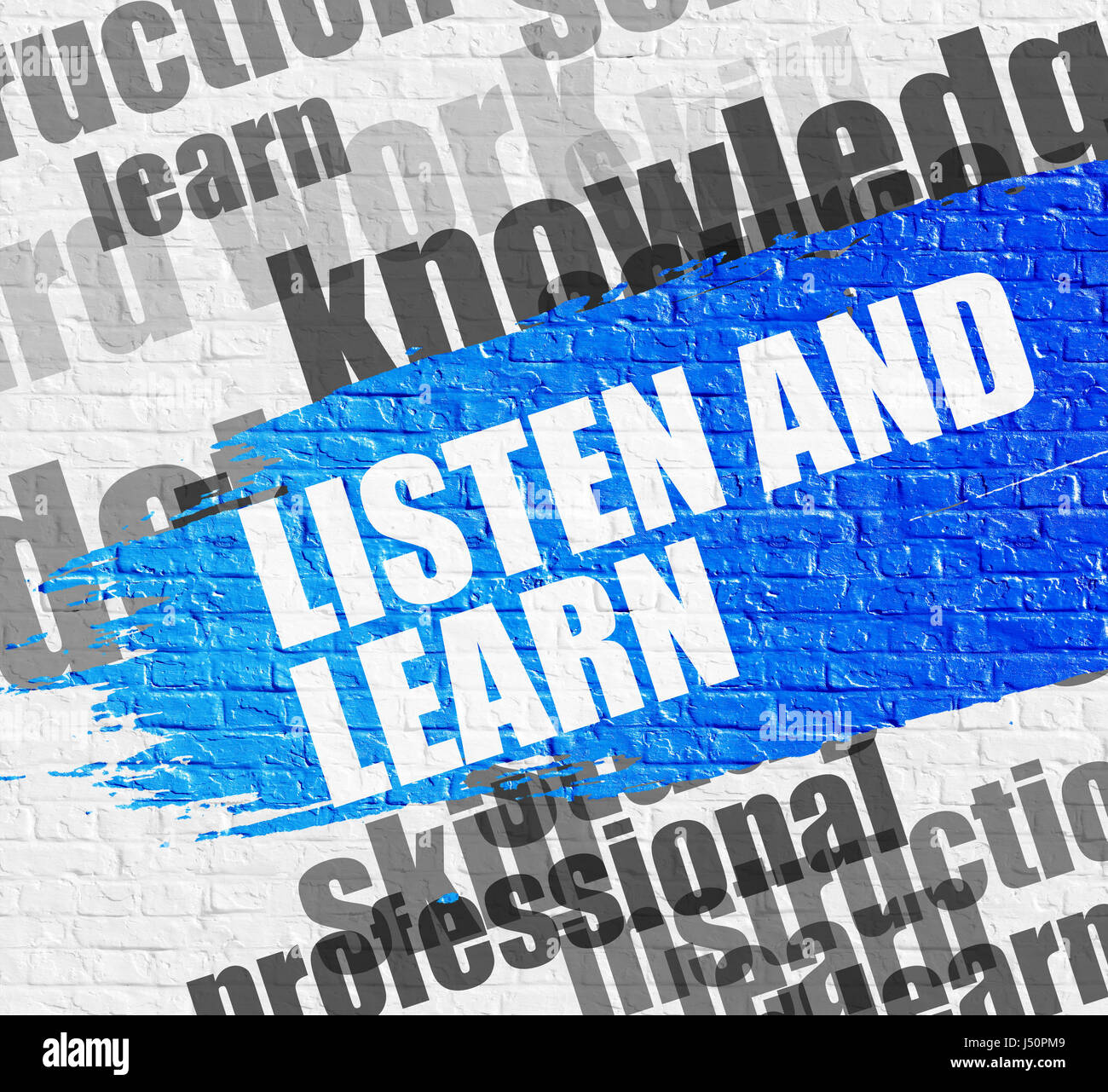 Listen And Learn on White Brick Wall. Stock Photo