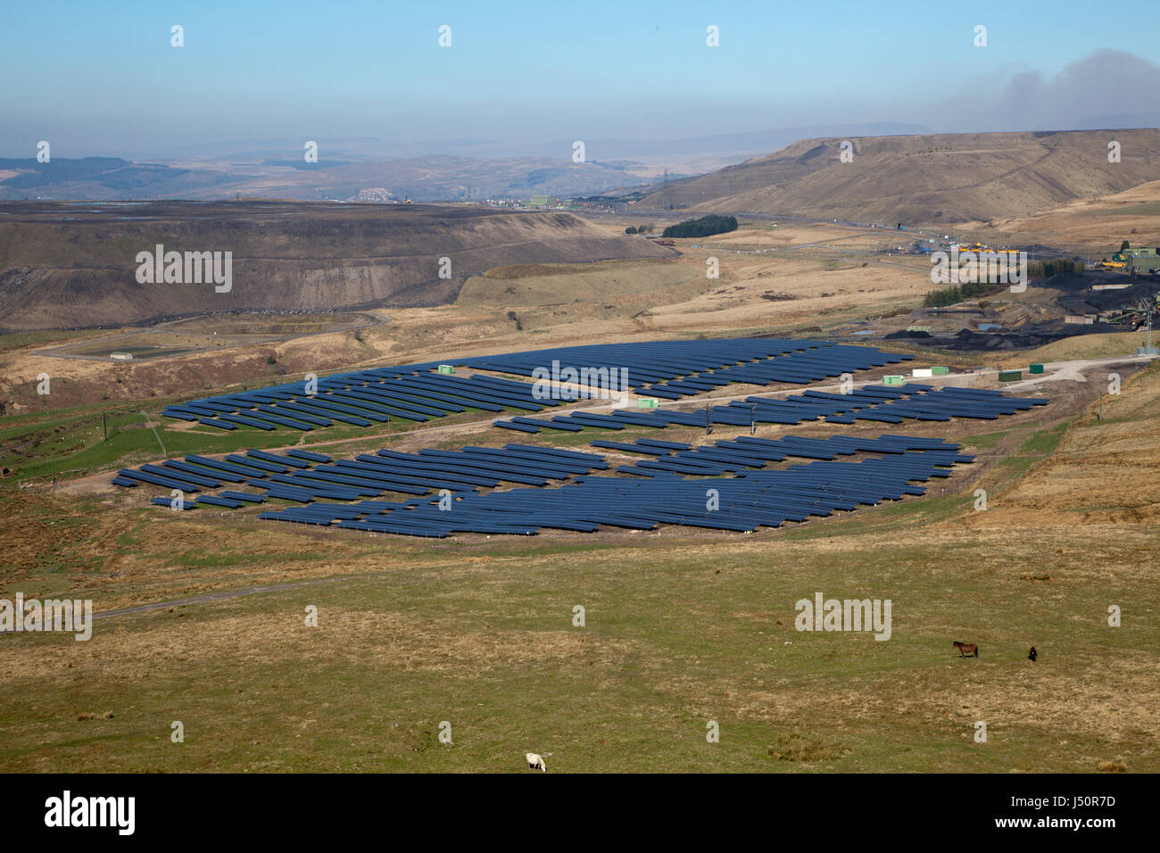 SolarPark next to Opencast coal mine showing clean green energy of