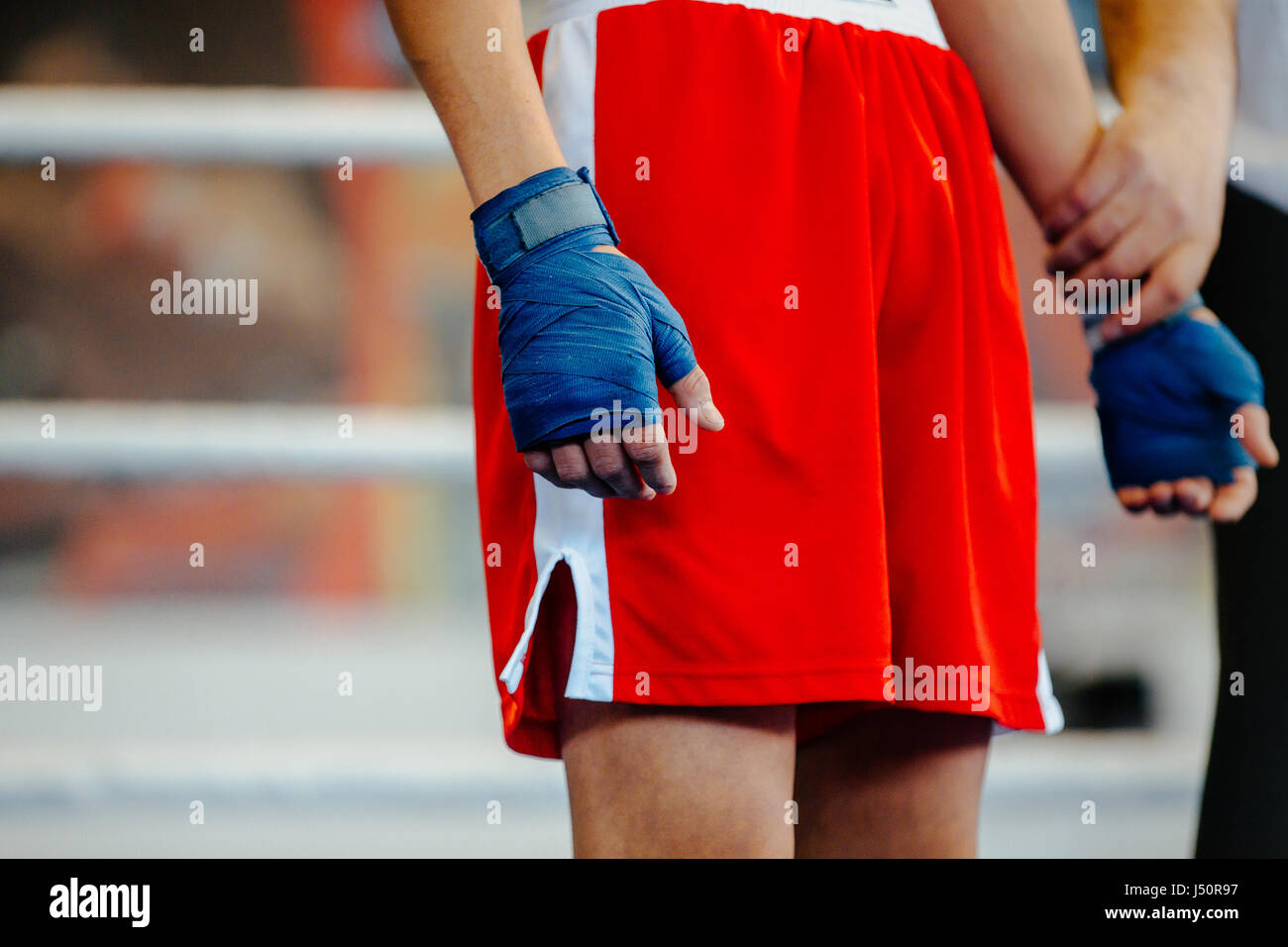 winner announced in boxing fight in ring Stock Photo