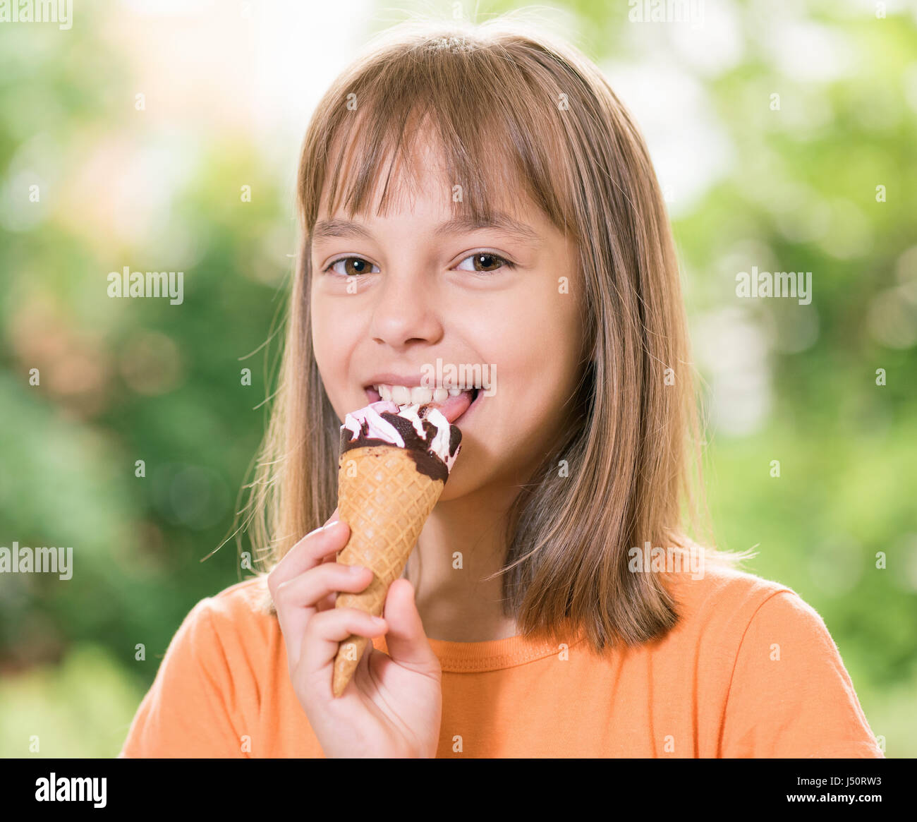 Little girl with ice cream Stock Photo