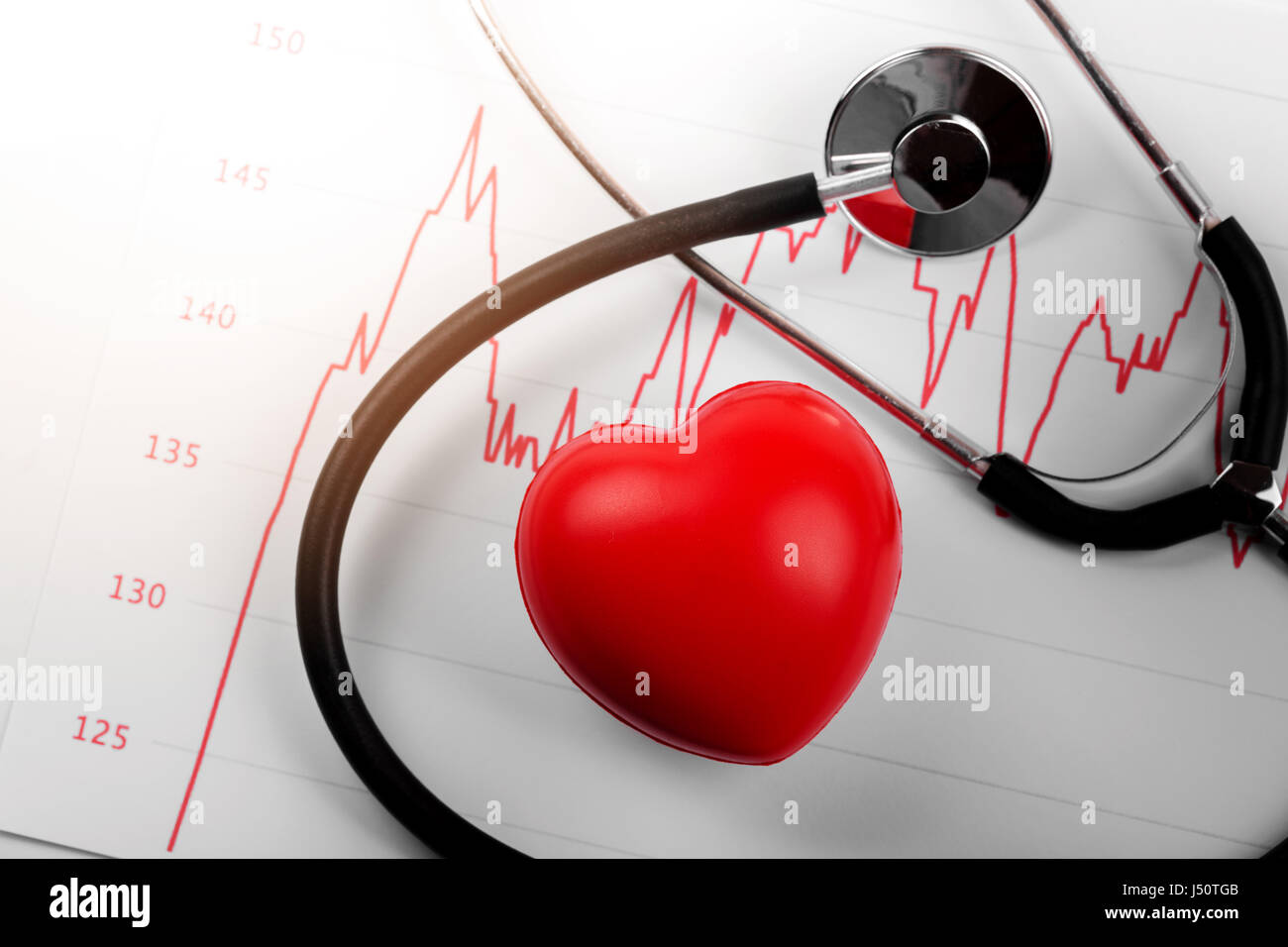 cardiogram with heart and stethoscope Stock Photo