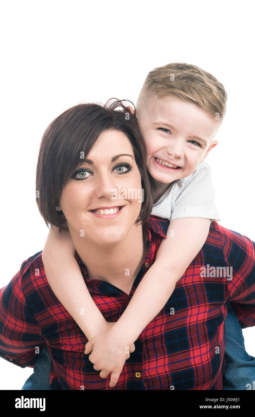 Happy mother and child smiling against white background Stock Photo - Alamy