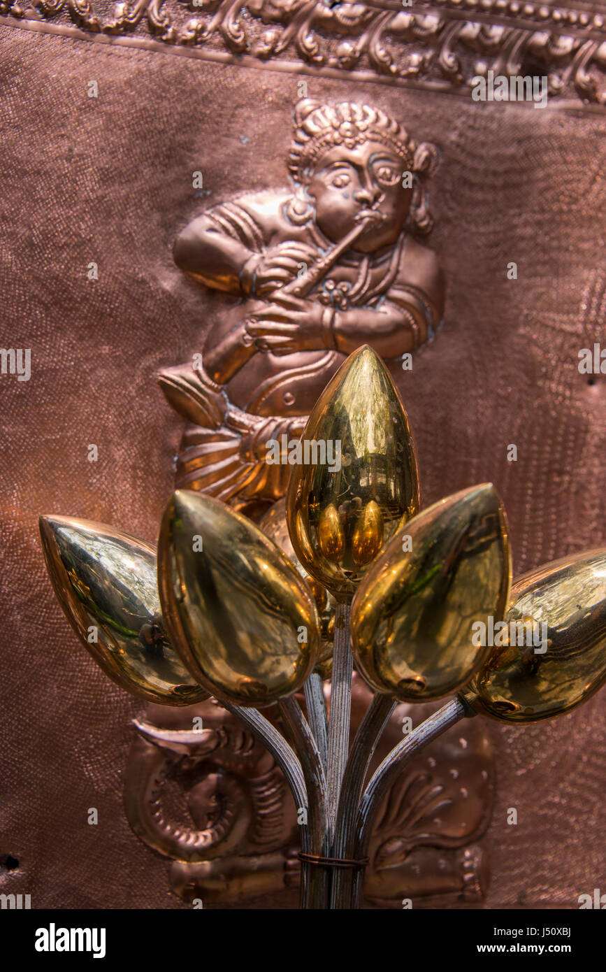 Sri Lanka, Colombo, Buddhist Temple. Detail of brass Sri Lankan artwork