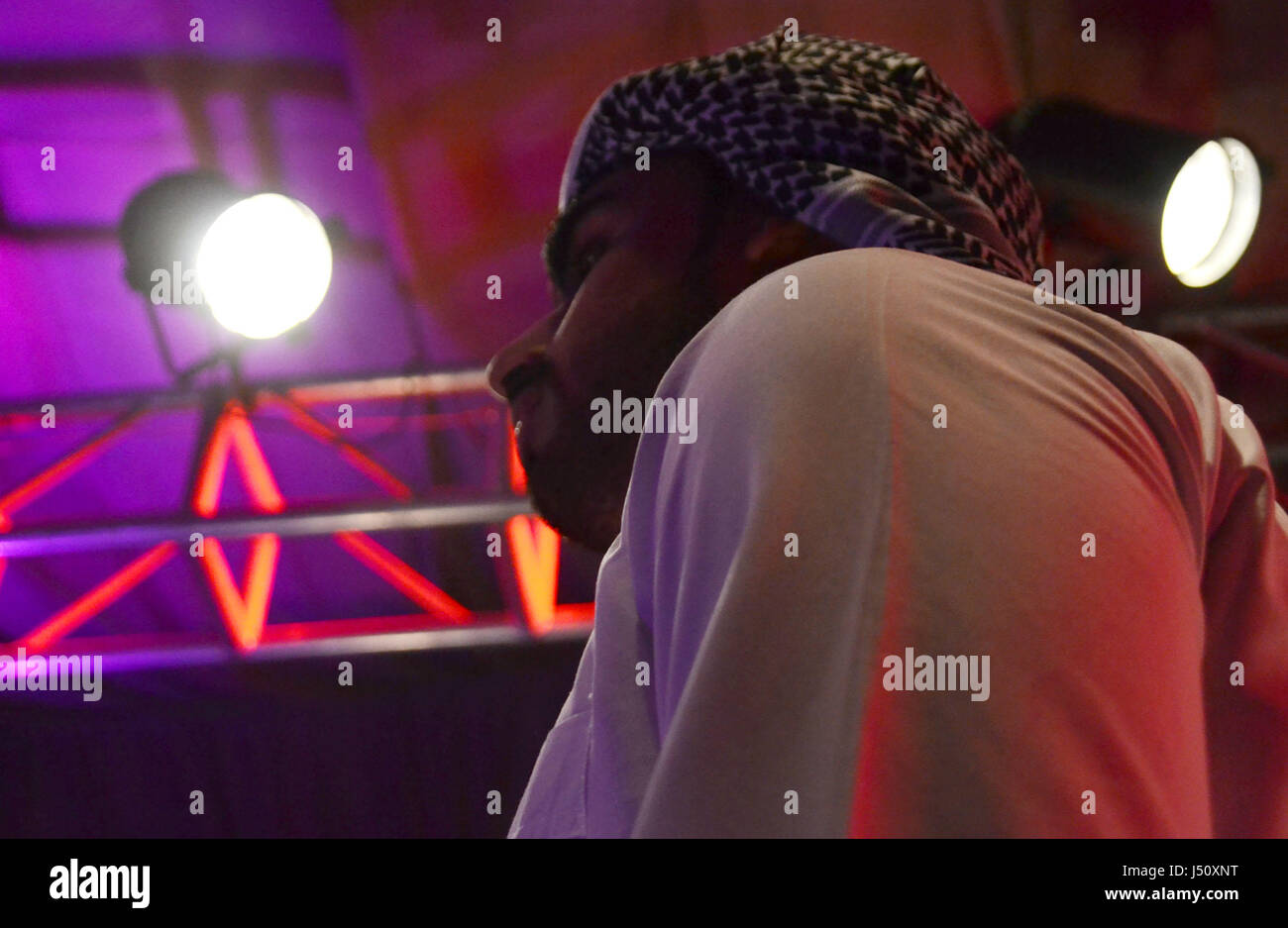 Male model in Arabic dress give pose during the ramp walk in Hyderabad