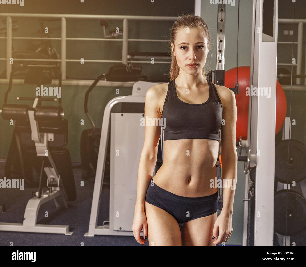 Young woman at the gym exercising beutiful still life Stock Photo