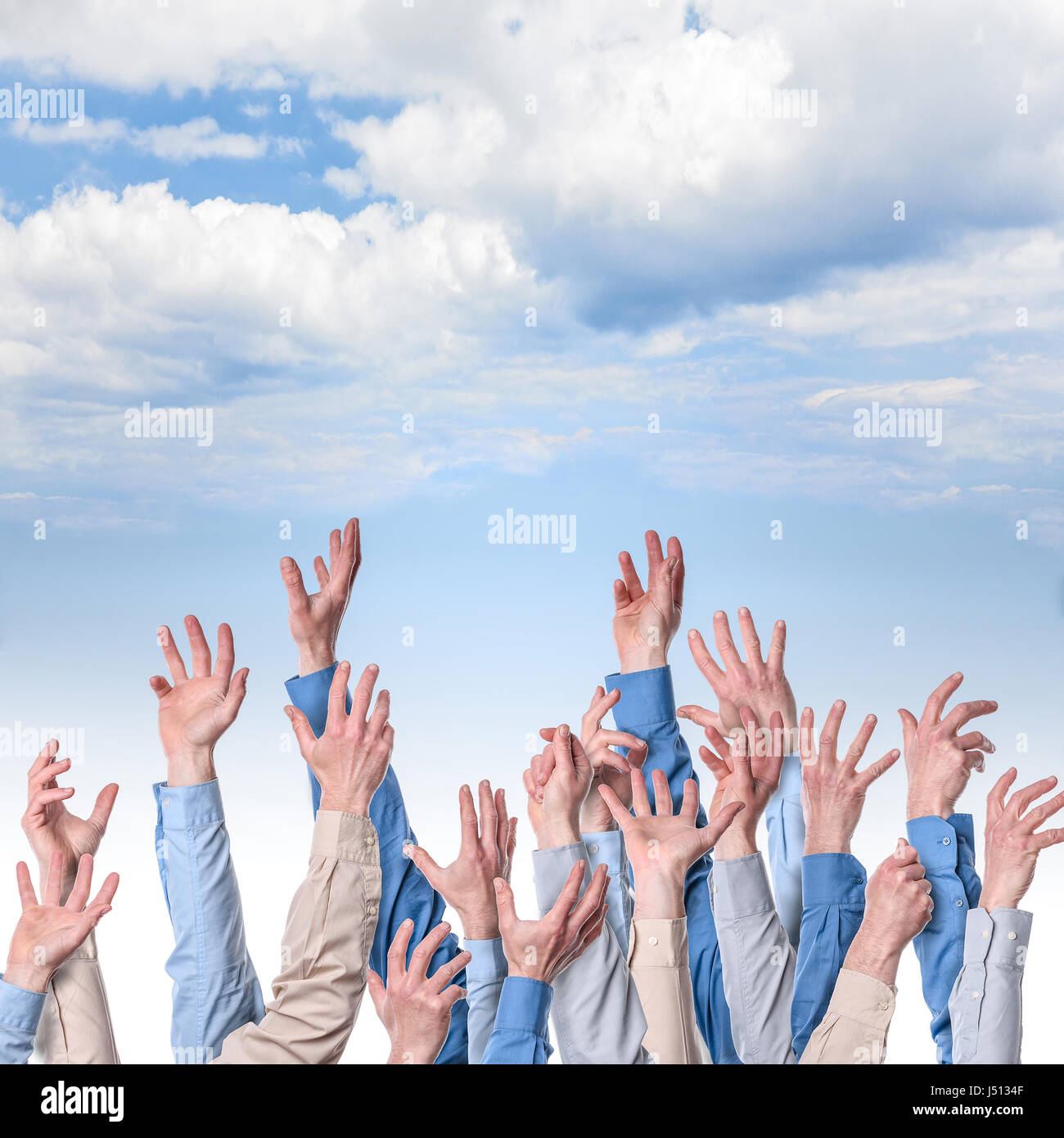lots of businessman arms and blue sky Stock Photo Alamy