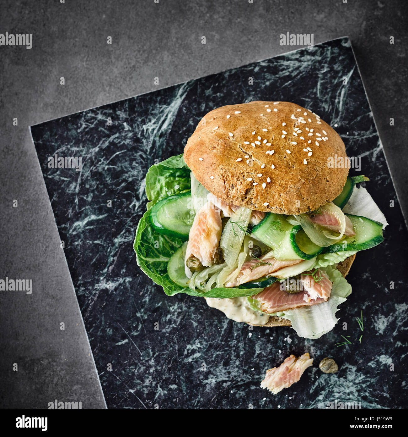 Burger with smoked trout Stock Photo