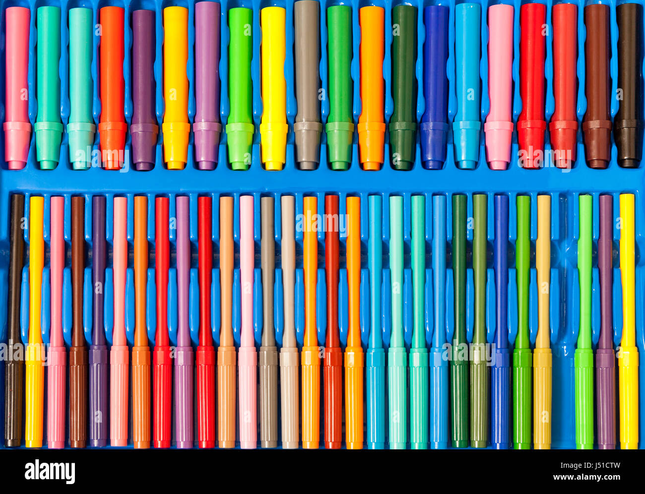 Colorful set of felt tip colouring in pens in a row from above  Model Release: No.  Property Release: No. Stock Photo