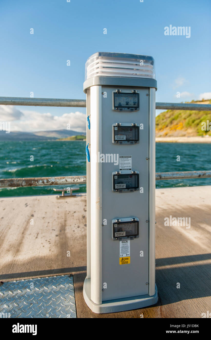 Marina utility pedestal with water and electric services in Bantry Harbour, Bantry, West Cork, Ireland with copy space. Stock Photo