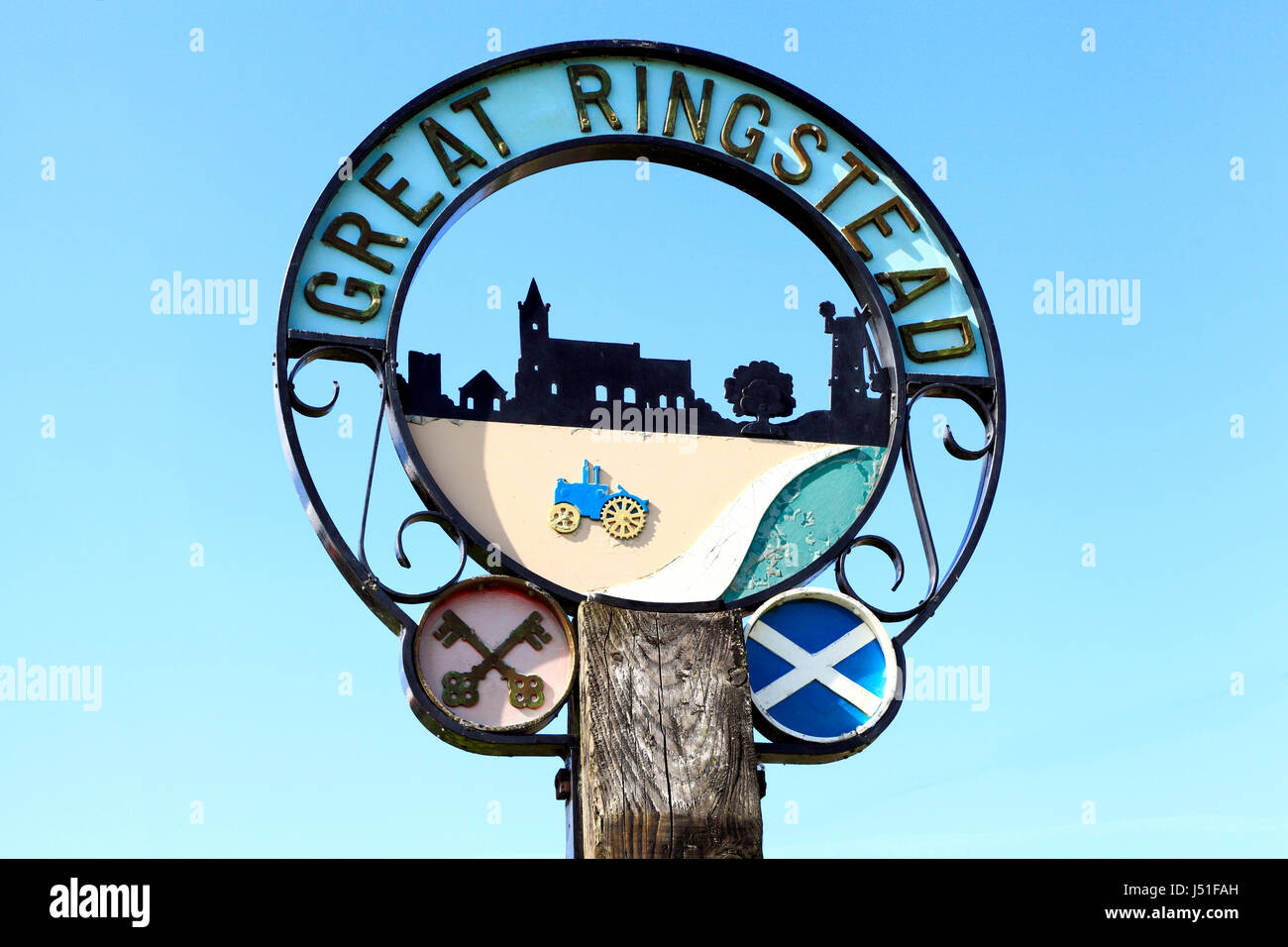 Great Ringstead, Norfolk, village sign, showing cross keys of St. Peter,  saltire cross of St. Andrew, England, UK Stock Photo