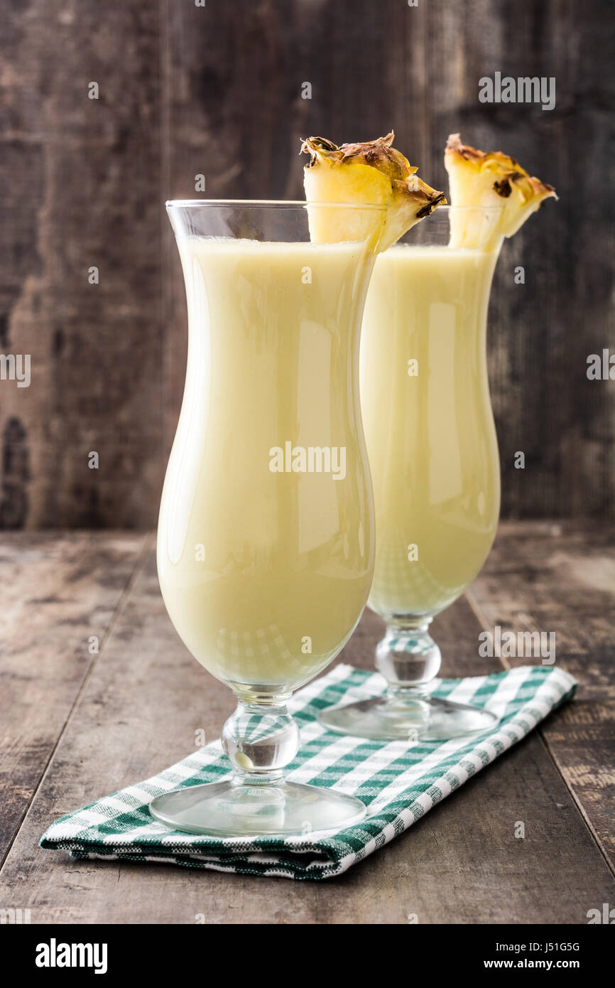 Pina colada cocktail on wooden background Stock Photo