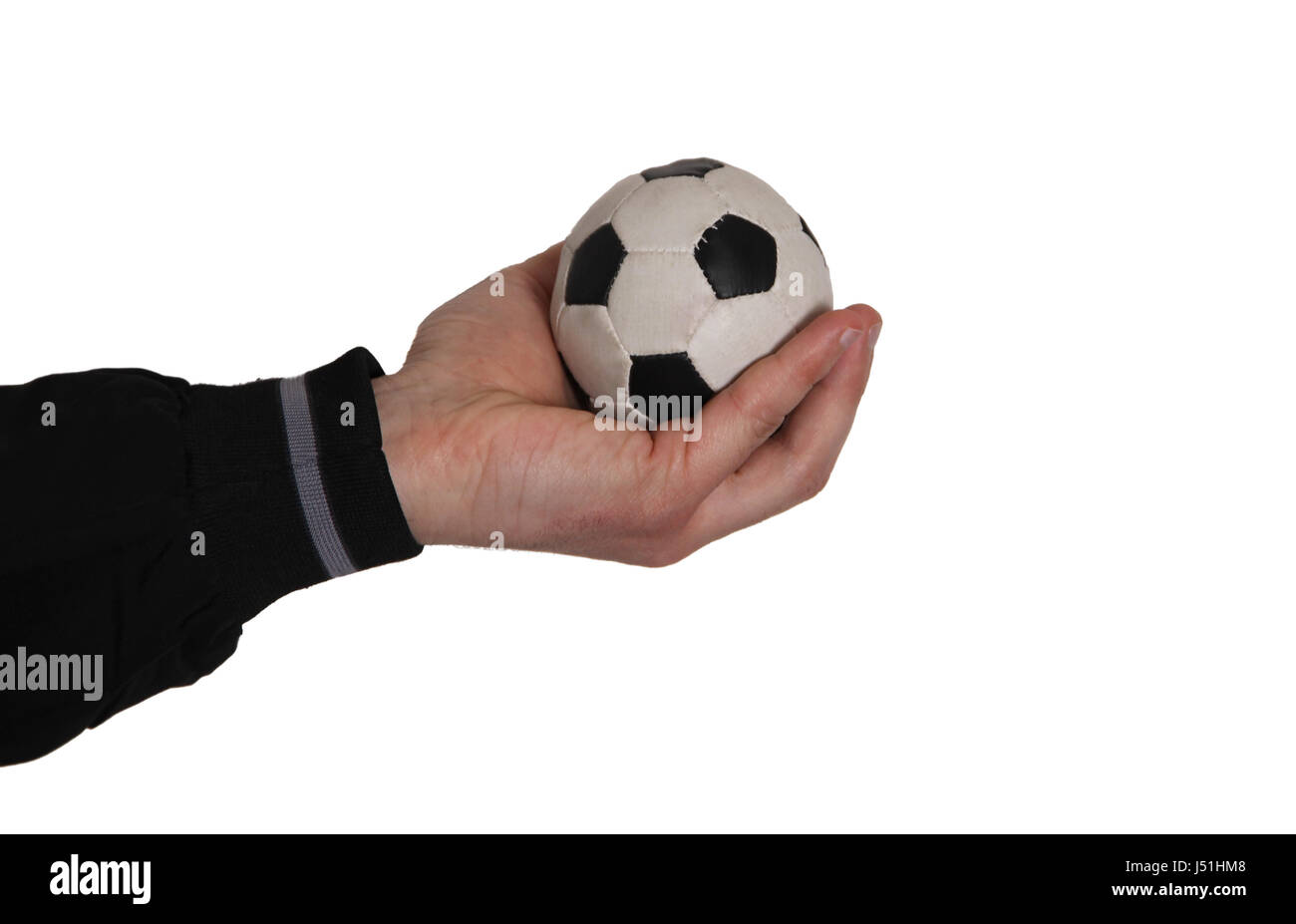 Soccer ball in hand Stock Photo Alamy