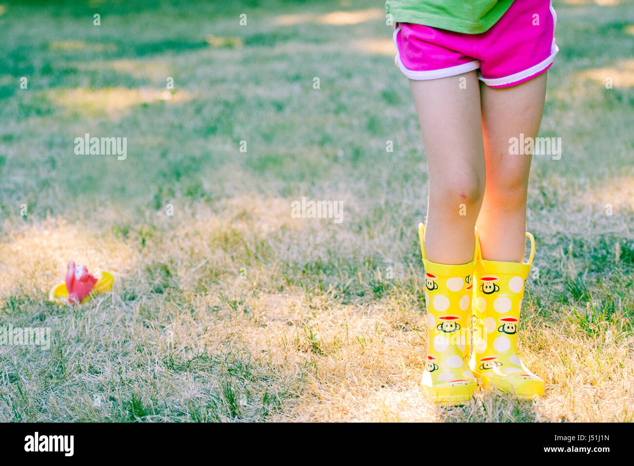 Girl in rain boots clearance