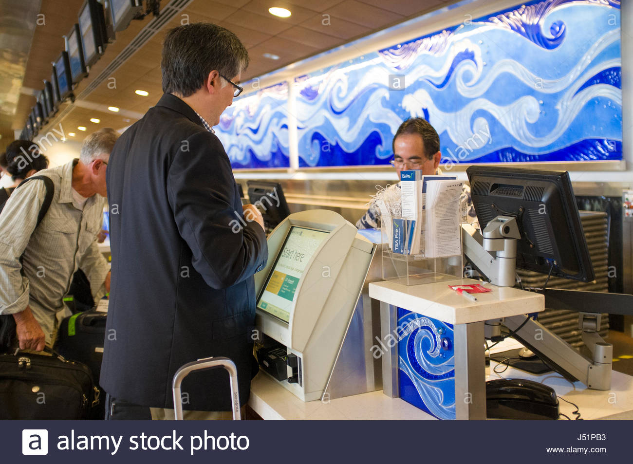 Man At United Airlines Check In Counter Honolulu International