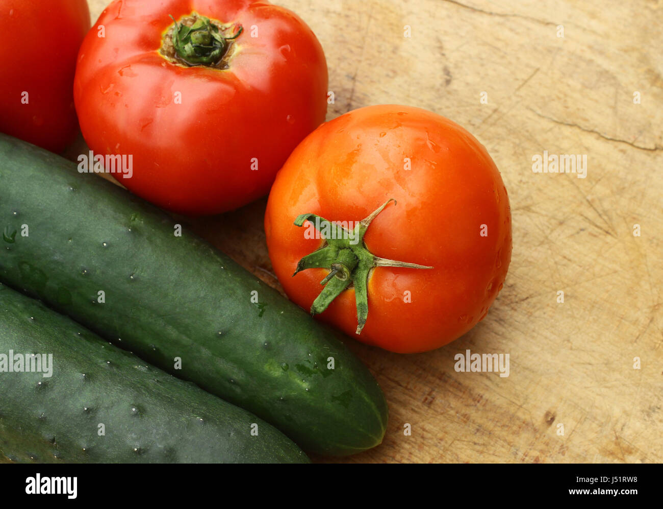 Cucumber and tomato Stock Photo - Alamy