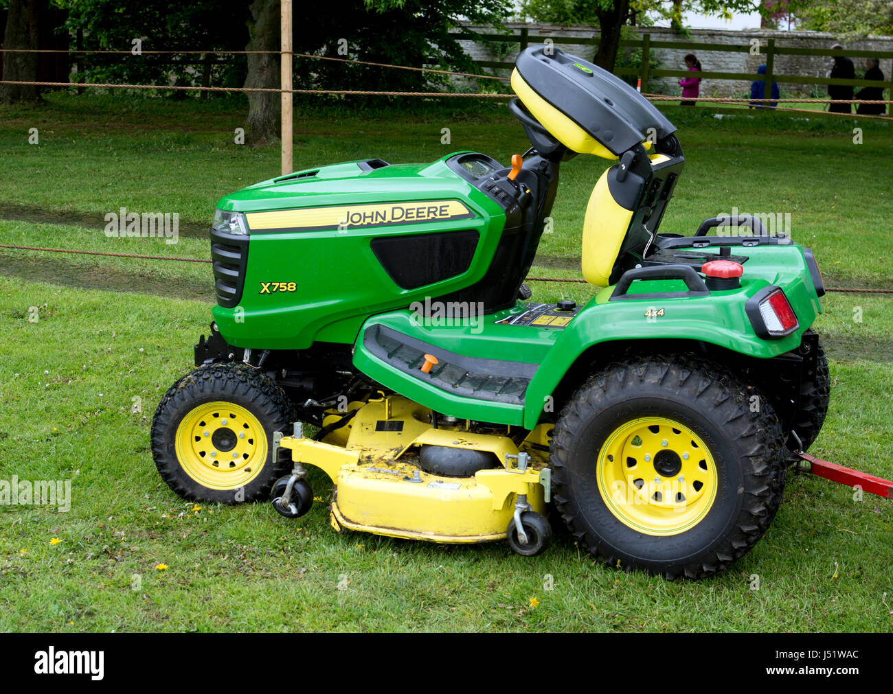 A John Deere rideon mower Stock Photo Alamy