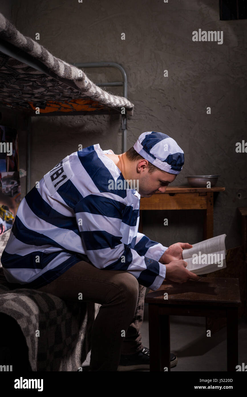 Prisoner sitting on bed in hires stock photography and images Alamy