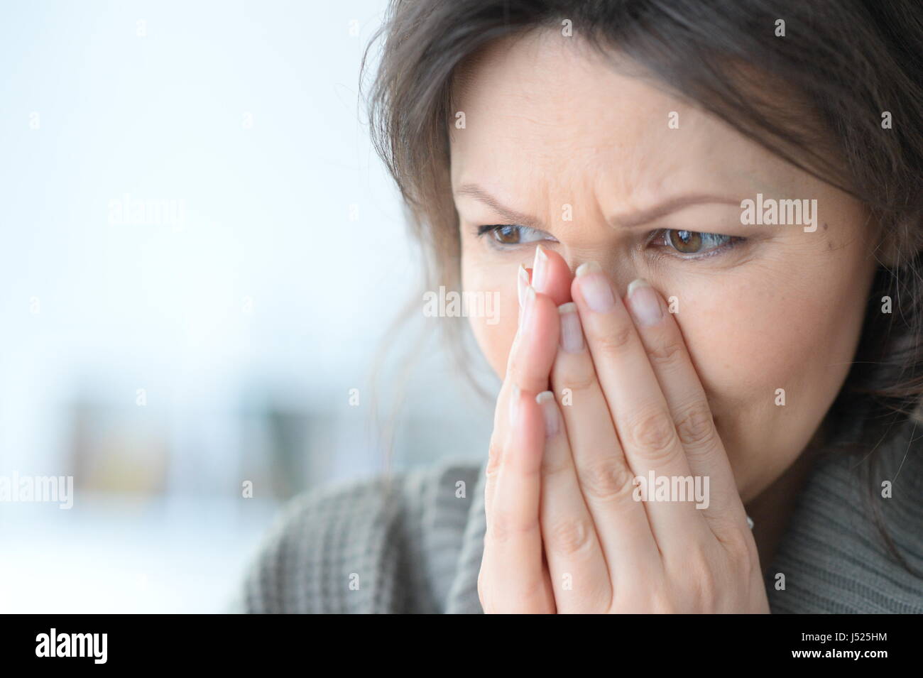 Crying young woman close-up Stock Photo