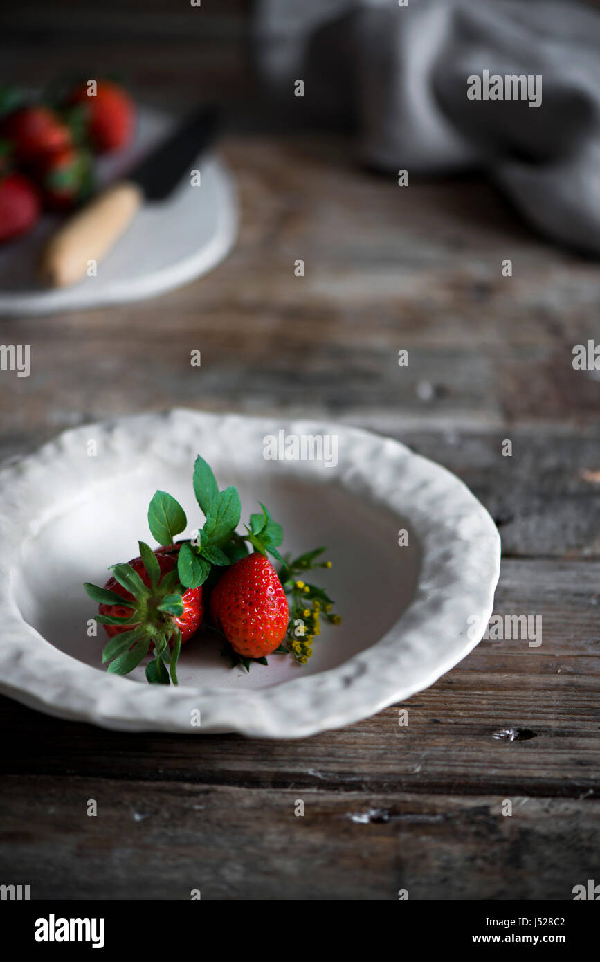 Strawberries in a country kitchen Stock Photo - Alamy