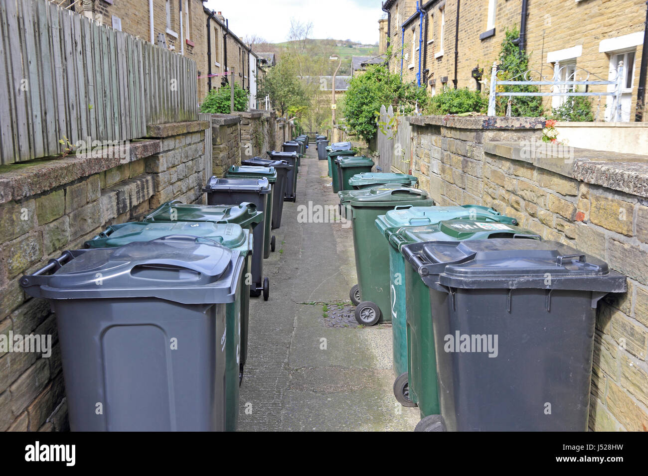 Salts Village back alley with wheelie bins Stock Photo