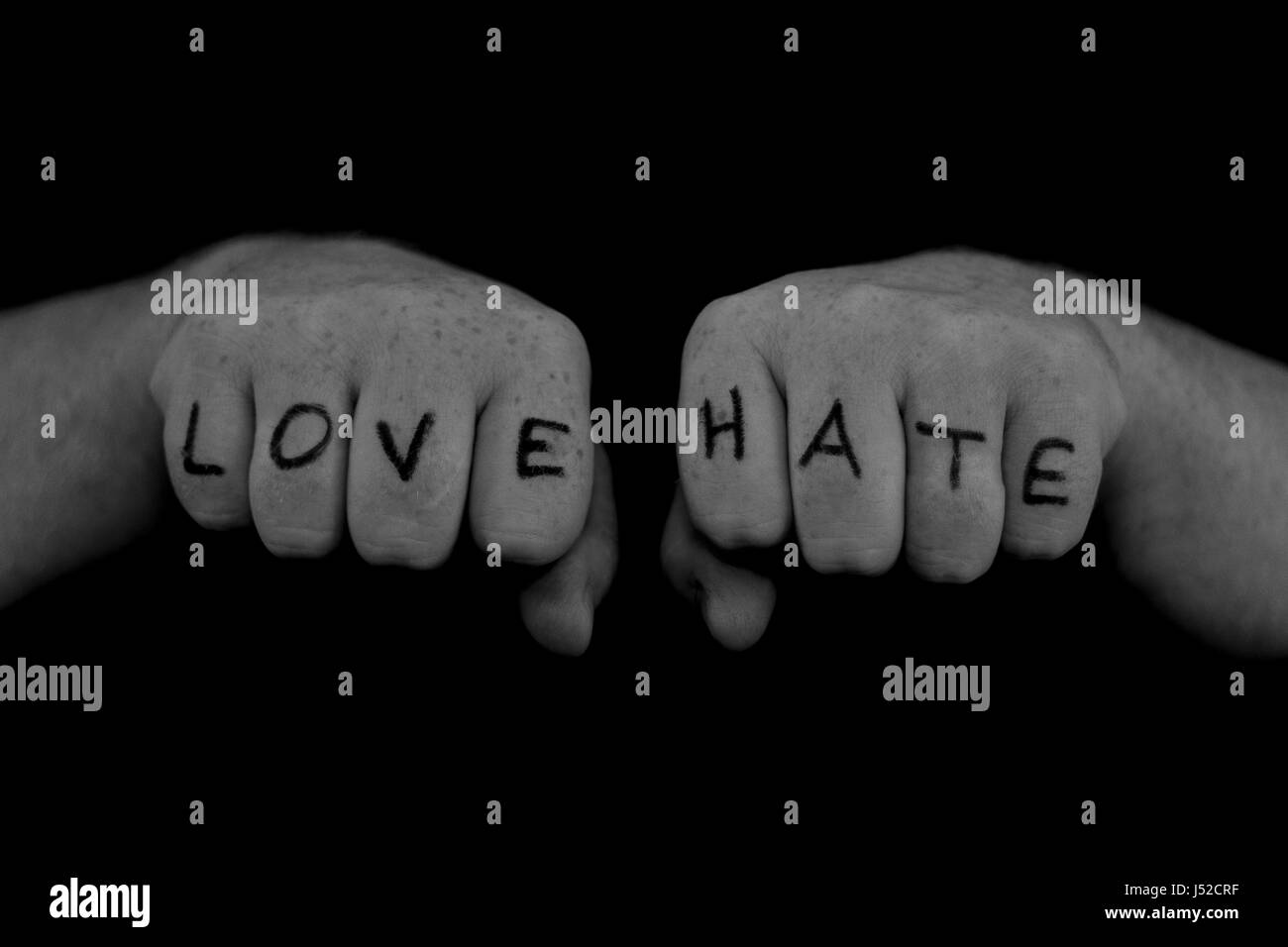 Black and white 'Love' and 'Hate' knuckle 'tattoo' Stock Photo