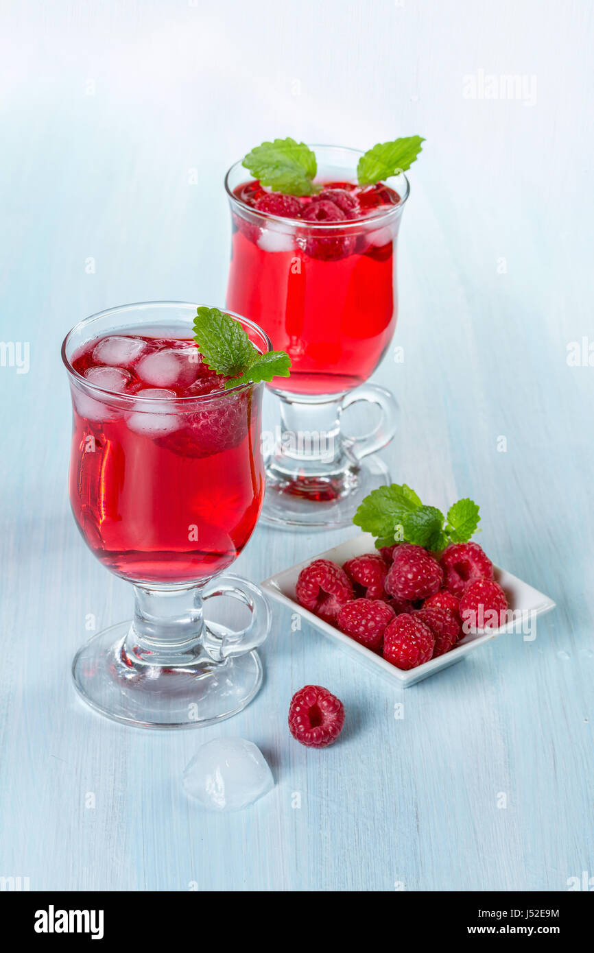 Alcohol cocktail with raspberries and mint Stock Photo