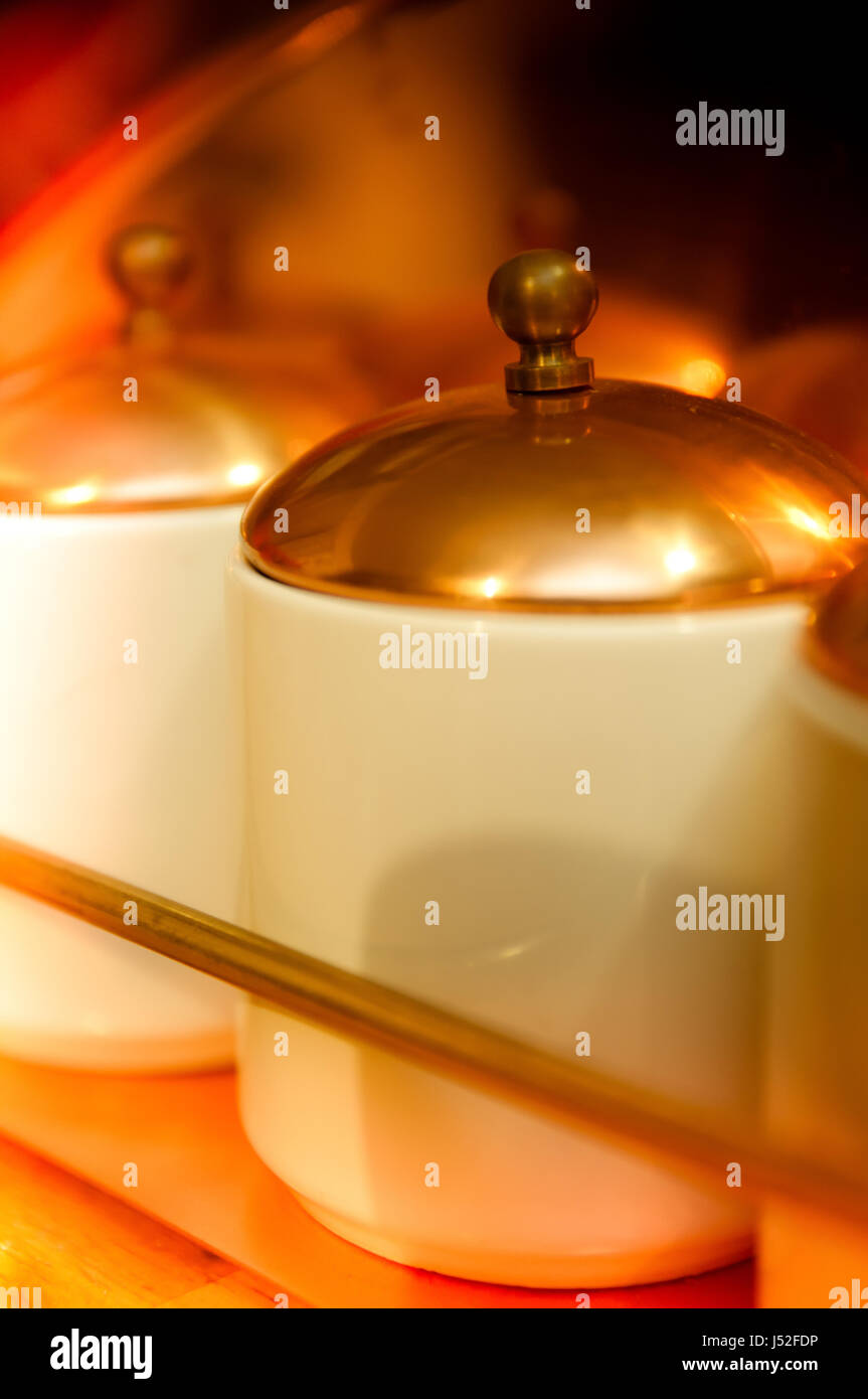 Copper and ceramic spice rack. Stock Photo